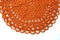 Handmade orange crochet doily