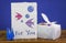 Handmade origami swans, card with origami fish together with Furoshiki fabric wrapped gift