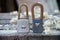 Handmade padlock wooden toy. On the wooden background with wooden shavings. Beautiful keyhole in the shape of hearts and