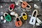 Handmade padlock wooden toy. On the wooden background with wooden shavings. Beautiful keyhole in the shape of hearts and