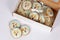 Handmade painted gingerbread with welsh corgi dog portraits in cardboard box. Beautiful cookies decorated by colorful frosting. Id