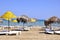 Handmade palm leaf and cane umbrellas on a beautiful Cyprus beach