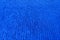 Handmade plain bright blue knitted fabric