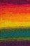 Handmade rainbow colored seamless knitted patterns texture with horizontal rows