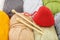 Handmade red heart and skeins of yarn for knitting. The concept of comfort and love