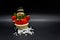 Handmade snowman figurine isolated on black background. Christmas decoration.