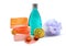 Handmade soap, blue colored shower gel bottle and soft bath puff or sponge.