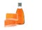 Handmade soap, orange colored shower gel bottle.