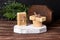 Handmade soap on wood podium on wooden background