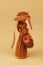 Handmade straw figure of a lovely woman wearing a hat