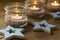 Handmade tea lights in jars with himalaya salt, wood decoration stars, Christmas, New Year, advent