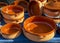 Handmade terracotta containers used in Mediterranean cuisine
