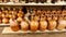 Handmade terracotta vases and cups at the pottery shop in Avanos.