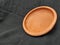 Handmade Traditional Clay or Sand Brown Color Bowl, Pot Lid  on a Black Background