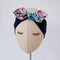 Handmade turban headbands with vintage and unique pattern on mannequin head