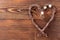 Handmade twigs heart on wood background for Valentine day