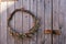 Handmade twisted natural creative dry herbal wreath from twigs of willow, wild and field flowers. Decoration on holiday