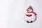 Handmade wood christmas decoration snowman on squared paper