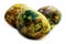 Handmade yellow green easter eggs painted marbled over white background