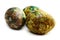 Handmade yellow green easter eggs painted marbled over white background