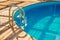 A handrail for pool stairs is an important safety feature in a swimming pool.