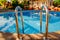 A handrail for pool stairs is an important safety feature in a swimming pool.