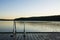 Handrails on the wooden swimming pier and The Lake Saimaa onthe background, Ukonlinna beach, Imatra, Finland