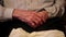 Hands of 93-year old man after two cerebral strokes