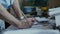 Hands adult male on the table. The man leaned on the tabl