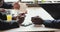 Hands of african businessmen talking in a cafe