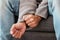 Hands, anxiety and closeup of a man with depression, mental health problem and stress in home lounge. Male person on a