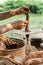 Hands of a artisan creating new clay shape from brown clay