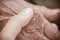 Hands of Asian woman holding poor elderly grandfather man hands wrinkled skin with feeling take care of Love. World Kindness Day