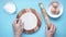 Hands baking dough with rolling pin on wooden table, top view