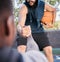 Hands, basketball and help with a man athlete and rival playing a competitive game on a sports court. Team, exercise and