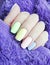 Hands beautiful colored different manicure fur glamour trend design