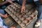 Hands of Black African People playing Mancala game, Dar Es Salaam, Tanzania. Mancala or Bao is a game which is very