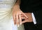 Hands of bride and bridegroom