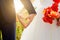 Hands of bride and groom in a shape of heart. Wedding ,love,heartconcept. In the hands of the bride bouquet of poppies. Wedding c