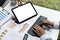 Hands of business woman typing on a tablet keyboard, she is using a messaging program to talk to a business partner who is opening