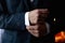 Hands of a businessman, closeup, button sleeves on a shirt