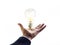 Hands of a businessman reaching to towards light bulb, business concept