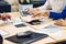 Hands of businesspeople working at desk in office