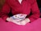 hands of a businesswoman holding australian banknotes