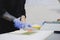 Hands of a chef cook slice ingredients for sushi roll