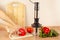 Hands chefs cut red bellpepper on kitchen table