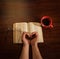 Hands With Coffee and Bible