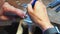 Hands of craftswoman working in workshop