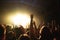 Hands of a dancing crowd at a rock concert of a cool band