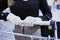 Hands in disposable gloves push shopping carts